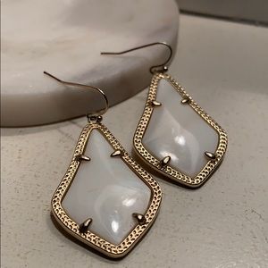 White and gold drop earrings
